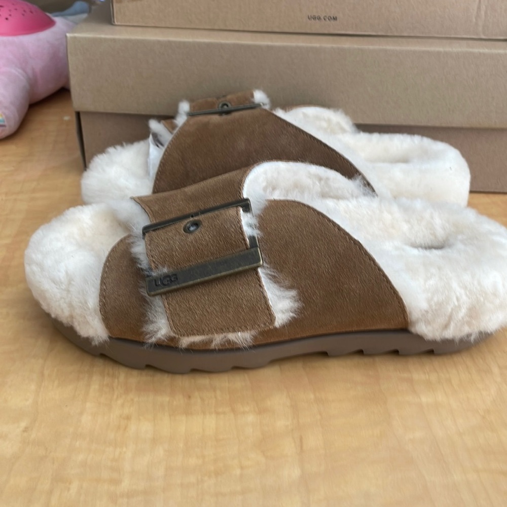 Ugg Women’s Outslide Buckle Slipper.